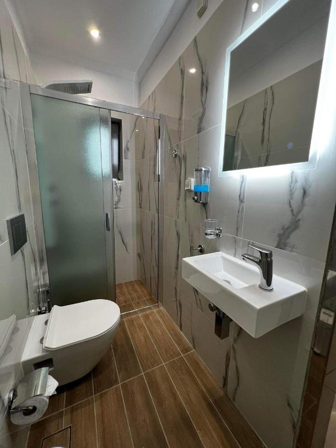 Atlantis Apartments Artémida Eksteriør bilde